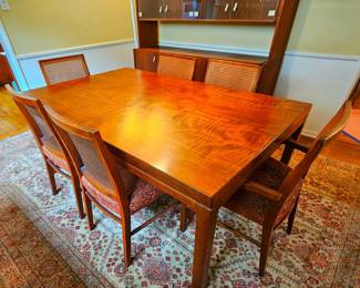 Danish Modern dining table, 6 cane back chairs & 2 leaves. Very good condition.