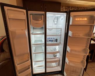 Very clean GE side-by-side refrigerator