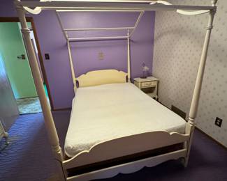 French provincial bedroom set which includes poster bed with canopy, chest, vanity with mirror, and nightstand