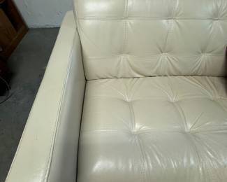 White/off-white leather sofa with ottoman in very nice condition