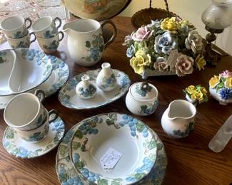 Metlox Poppytrail dish set, Capodimonte Italian porcelain flowers, Richardson Bros. oak table