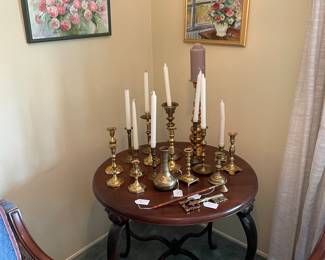 Side table, brass candlesticks, original art