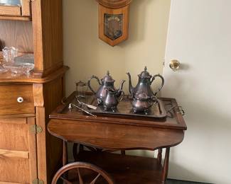 Antique bar cart, silver plated tea set, Regulator clock