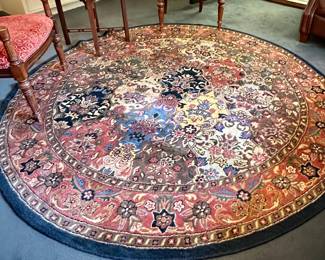 8' round wool machine Oriental rug