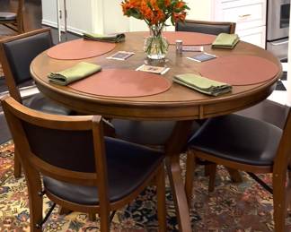 Four padded folding chairs