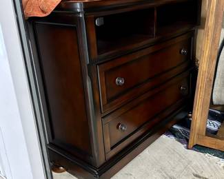Media cabinet w/two deep drawers and two open slots, solid wood.