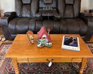 SOLD-Brown Leather sofa.
coffee table, wood items by Fred Von Tobel
