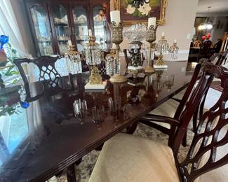 Dining table with upholstered chairs and leafs 