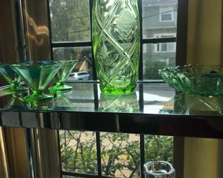 Uranium glass items on Maison Jansen etagere.