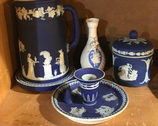 Dark blue Jasperware pitcher, lidded cannister, and candleholder. White and blue vase.