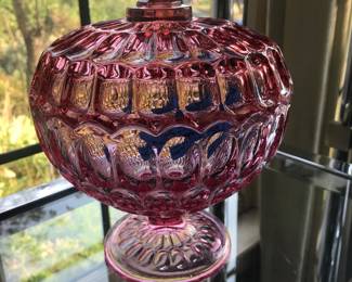 Large pink depression glass candy dish with lid.