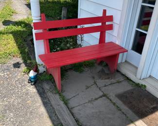 One of two red wood benches