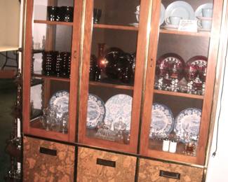 Beautiful   china hutch with storage below and glass front doors.  