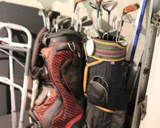 Assorted golf clubs