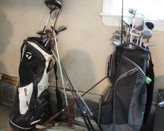 Assorted golf clubs