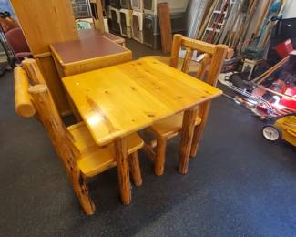 Log style table w/ two chairs $175