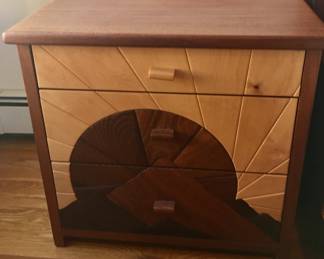 One of two handcarved bedside consoles by Sam Quintana