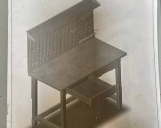 We've assembled this work bench... just a few too many things sitting on it for a good pick right now.