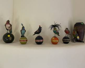 Birds of a feather on croquet balls