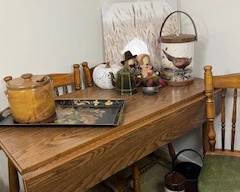 drop leaf table with kitchenwares