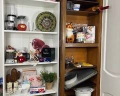 white shelves and pantry cupboard