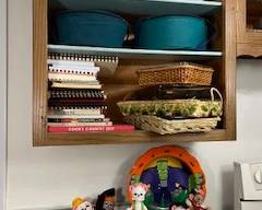 cupboard left of stove