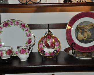 Beautiful Selection of Porcelain and China Available Including a Royal Albert "Old English Roses" Porcelain Serving Plate Shown with Matching Cream & Sugar Beside a Royal Albert "Gilded Rose" Teacup & Saucer. Also Shown are a Pair of Limoge Decorative Plates