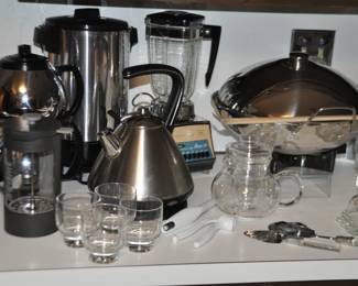 Shown are Small Kitchen Appliances including a Chantel Electric Tea Kettle, a Vintage Sunbeam Coffee Maker, a Vintage Osterizer Classic 8 Blender and a Farberware Electric Wok.