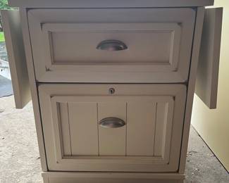 Desk Includes this Hooker Furniture Company Two-Drawer Mobile File Cabinet on Wheels with Folding Sides. 21.75"W x 23.5"H x 23"D