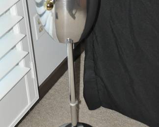 Perfect for Entertaining, this Mid-Century Art Deco Standing Champagne Ice Bucket In Aluminum, Brass & Iron is the Perfect Accessory to Any Formal Party. (30"H)