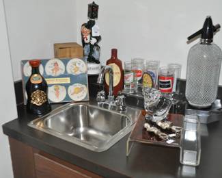 Included in our Bar Area you Will Find Vintage Cartoon Coasters, a Vintage Musical Decanter and Much More!