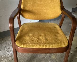 Herman Miller for Knoll International Mid-Century Bentwood Style  Walnut Arm Chair, Needs Refinishing.  Knoll Described the Petit Chair, "is made of a continuous curve of walnut that delights the eye from every angle."  22.25"W x 23.75"D x 21"H