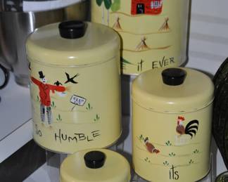 Mid Century "Be it Ever So Humble its Ours" Set of Four Aluminum Canisters. c.1950"s