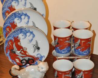 Exquisite Collection of Vintage Takahashi Shokai (Japan) for I. Magnin, "Crane & Waves" Bone China Coffee Mugs and Dessert Plates Shown with a NAO Persian Cat Figurine.
