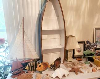 Wooden Boat Display with Nautical Decor. 