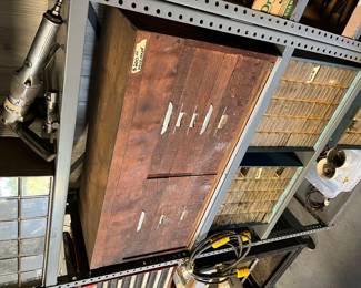 Hand made machines chest, lid lifts up.