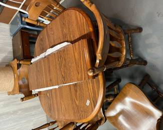 Great oak table with leaf and six chairs.