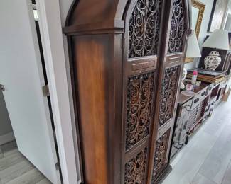 vintage Gothic arched bar cabinet 
