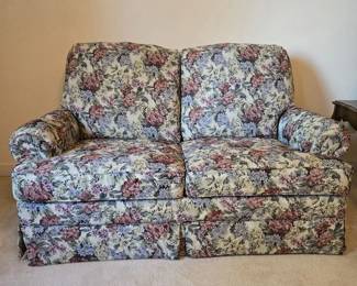 Nice Skirted Loveseat with Floral Upholstery Pattern