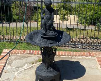Beautiful iron birdbath fountain. 