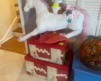 Unicorns are real! Tow matching storage lidded chests. 
