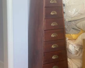 There are three furniture pieces that match. Two like the one in this pic. (One is larger) and a chest of drawers. 