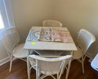 Vintage game table and 4 matching chairs. Beautiful paint. The paint has the warm patina that only vintage furniture has. 