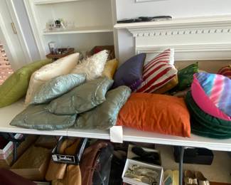 Large assortment of throw pillows. 