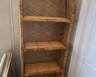 Rattan shelf. There is a matching small shelf. 