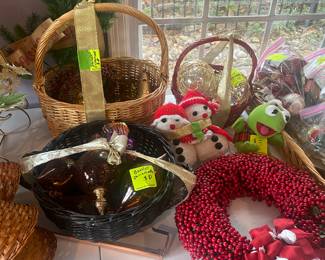 Baskets of beautiful glass Christmas tree ornaments. 