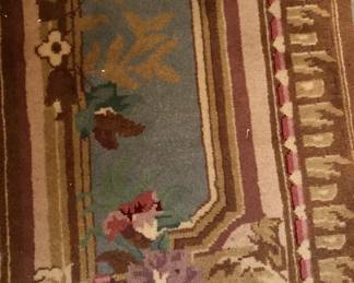 DETAIL OF AREA RUG