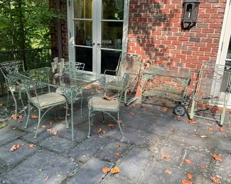 Meadowcraft wrought iron & glass top dining table w/4 chairs-$400.                                                                                                     Meadowcraft wrought iron bar cart-$100