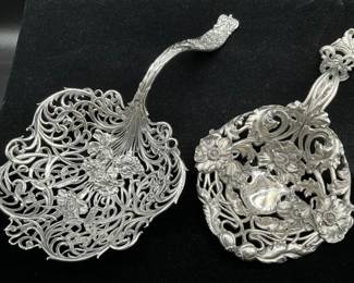 Whiting Sterling (left) large Bonbonnier-$600.                        Black, Starr & Frost Sterling silver spoon rest-$330