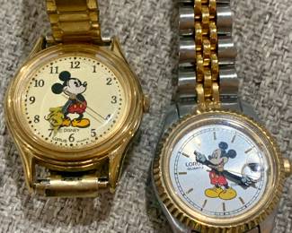Disney Mickey Mouse watches (one on right side is by Lorus)